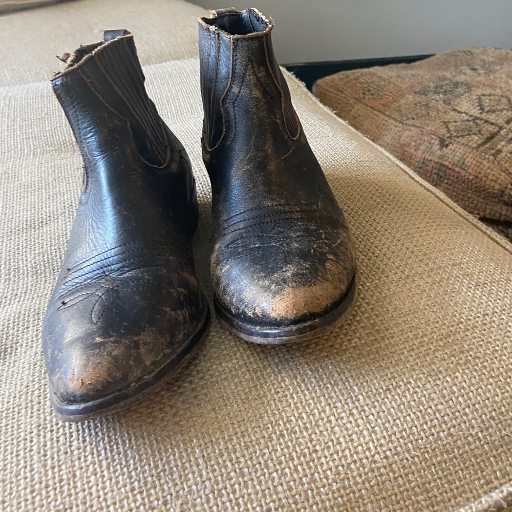 Understated leather distressed black boots